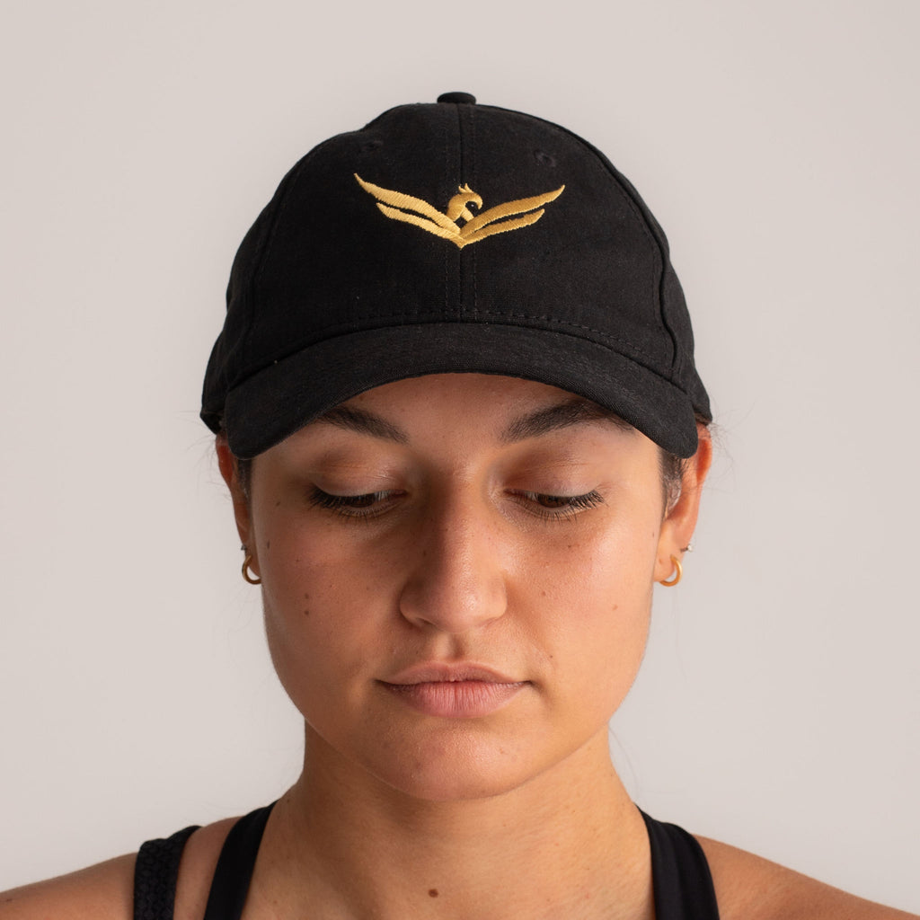 Wild Warrior cap with gold wings logo embroidery, front view.